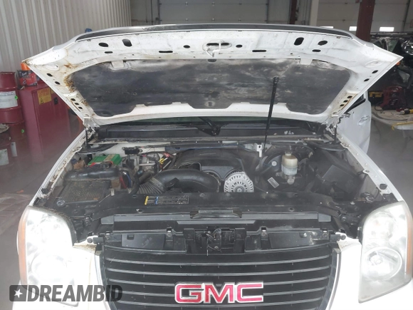 2007 GMC Yukon SLT with VIN 1GKFK130X7R203221, listed as a IAAI auction lot 41583409 with 254,586 mi miles. Bid and sale history available at carsss.com. Image 10.