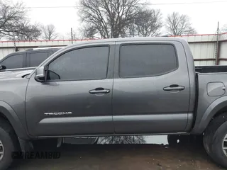 2020 Toyota Tacoma SR5 with VIN 5TFCZ5AN1LX227753, listed as a IAAI auction lot 41543939 with 35,860 mi miles and . Bid and sale history available at DreamBid. Image 14.