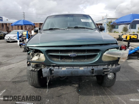 2000 Ford Explorer XLT z VIN 1FMZU73E9YZB18904, wystawiony jako Copart lot #47890925 z przebiegiem 248 363 mil mil oraz Szkoda całkowita • Salvage title. Historia ofert i sprzedaży dostępna na DreamBid. Obrazek 5.