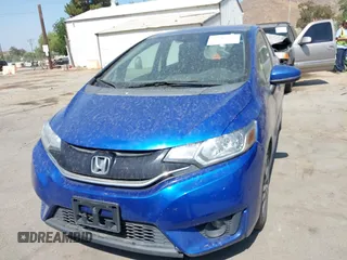 2015 Honda Fit EX-L z VIN 3HGGK5H85FM730218, wystawiony jako IAAI lot #42818190 z przebiegiem 153 822 mil mil oraz . Historia ofert i sprzedaży dostępna na DreamBid. Obrazek 6.