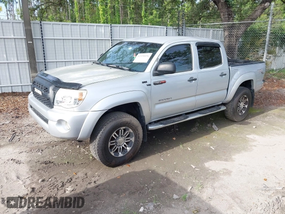 2005 Toyota Tacoma PreRunner z VIN 3TMJU62N15M003398, wystawiony jako IAAI lot #42490056 z przebiegiem 246 125 mil mil oraz . Historia ofert i sprzedaży dostępna na DreamBid. Obrazek 2.