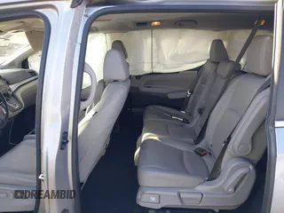 2018 Honda Odyssey EX-L with VIN 5FNRL6H71JB089289, listed as a IAAI auction lot 41813322 with 94,933 mi miles and . Bid and sale history available at DreamBid. Image 8.