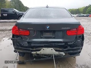 2015 BMW 3 Series 328i xDrive with VIN WBA3B3C53FF545614, listed as a IAAI auction lot 42020617 with 133,107 mi miles and . Bid and sale history available at DreamBid. Image 6.