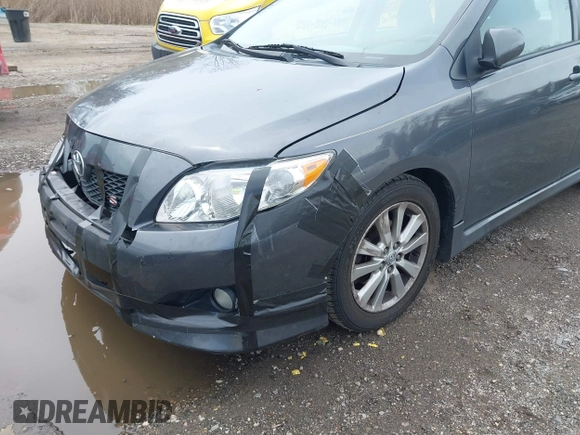2010 Toyota Corolla with VIN 2T1BU4EE8AC459793, listed as a IAAI auction lot 41967607 with 202,762 mi miles. Bid and sale history available at carsss.com. Image 13.