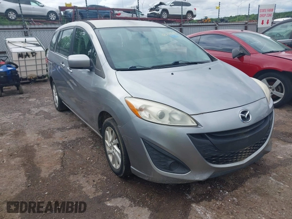 2012 Mazda 5 Sport with VIN JM1CW2BL0C0111151, listed as a IAAI auction lot 42359887 with 158,986 mi miles and . Bid and sale history available at DreamBid. Image 1.