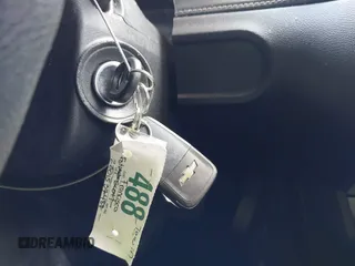 2014 Chevrolet Camaro LS z VIN 2G1FA1E32E9147104, wystawiony jako IAAI lot #42324064 z przebiegiem 70 585 mil mil oraz . Historia ofert i sprzedaży dostępna na DreamBid. Obrazek 11.