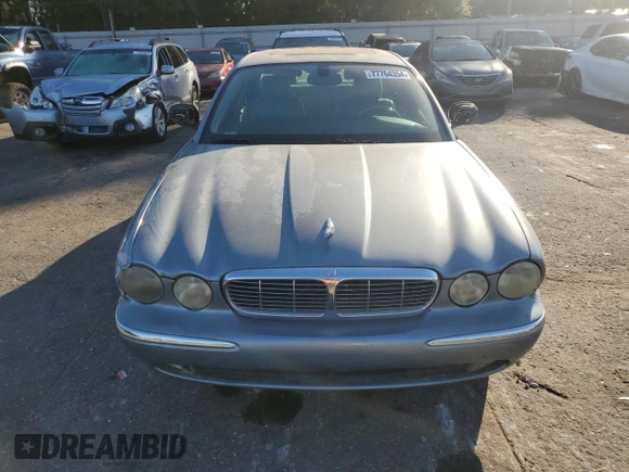 2005 Jaguar XJ with VIN SAJWA79C95SG45730, listed as a Copart auction lot 77764354 with 0 mi miles and Clean Title. Bid and sale history available at carsss.com. Image 5.