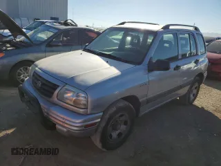 2003 Suzuki Vitara z VIN 2S3TE52V936103483, wystawiony jako Copart lot #82235884 z przebiegiem 173 354 mil mil oraz Szkody całkowita. Historia ofert i sprzedaży dostępna na DreamBid. Obrazek 1.