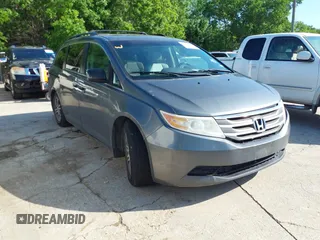 2011 Honda Odyssey EX-L with VIN 5FNRL5H6XBB073482, listed as a IAAI auction lot 42090463 with 213,061 mi miles and . Bid and sale history available at carsss.com. Image 1.