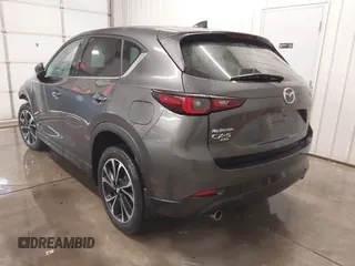 2023 Mazda CX-5 2.5 S Premium Package with VIN JM3KFBDM0P0172983, listed as a IAAI auction lot 41374321 with 19,032 mi miles. Bid and sale history available at carsss.com. Image 3.