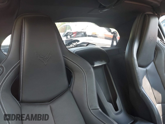 2023 Chevrolet Corvette 1LT z VIN 1G1YA2D42P5116136, wystawiony jako IAAI lot #39475074 z przebiegiem Nie podano mil oraz . Historia ofert i sprzedaży dostępna na DreamBid. Obrazek 8.