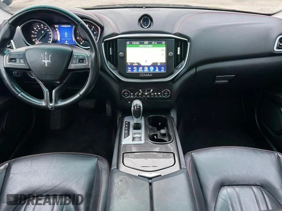 2015 Maserati Ghibli z VIN ZAM57XSA2F1159438, wystawiony jako Copart lot #49187735 z przebiegiem 73 996 mil mil oraz Szkoda całkowita • Salvage title. Historia ofert i sprzedaży dostępna na DreamBid. Obrazek 6.