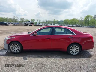 2014 Cadillac CTS AWD z VIN 1G6AW5SX3E0129127, wystawiony jako IAAI lot #42193399 z przebiegiem 108 037 mil mil oraz . Historia ofert i sprzedaży dostępna na DreamBid. Obrazek 15.