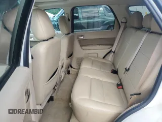 2011 Ford Escape Limited z VIN 1FMCU0EG2BKC70972, wystawiony jako Copart lot #58981605 z przebiegiem 120 117 mil mil oraz Szkoda całkowita • Salvage title. Historia ofert i sprzedaży dostępna na DreamBid. Obrazek 10.