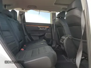 2021 Honda CR-V Touring z VIN 2HKRW2H92MH661297, wystawiony jako Copart lot #55984455 z przebiegiem 23 437 mil mil oraz Szkoda całkowita • Salvage title. Historia ofert i sprzedaży dostępna na DreamBid. Obrazek 11.
