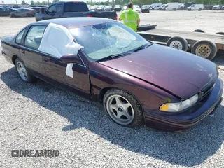 1995 Chevrolet Caprice z VIN 1G1BL52P1SR136345, wystawiony jako IAAI lot #42295367 z przebiegiem 37 725 mil mil oraz . Historia ofert i sprzedaży dostępna na DreamBid. Obrazek 1.