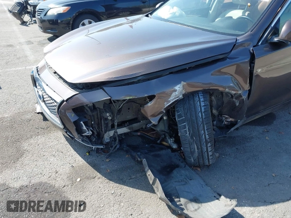 2014 Infiniti Q50 с VIN JN1BV7AP8EM670333, выставлен на аукционе IAAI как лот 41670015 с пробегом 59 427 миль миль и . История ставок и продаж доступна на DreamBid. Изображение 6.