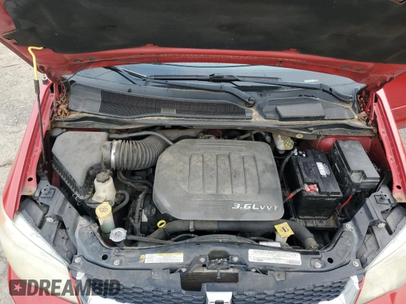 2012 Dodge Grand Caravan SXT with VIN 2C4RDGCG3CR236407, listed as a Copart auction lot 54771015 with 184,859 mi miles and Clean Title. Bid and sale history available at DreamBid. Image 12.