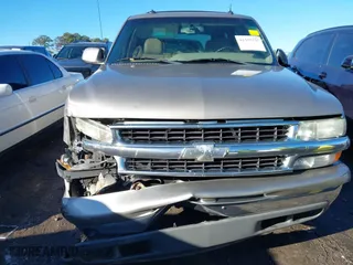 2003 Chevrolet Tahoe LS with VIN 1GNEC13Z03J145204, listed as a IAAI auction lot 41355337 with 245,498 mi miles. Bid and sale history available at carsss.com. Image 6.