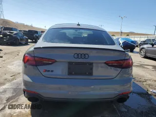 2019 Audi RS 5 Sportback z VIN WUABWCF52KA903181, wystawiony jako Copart lot #46123525 z przebiegiem 32 366 mil mil oraz Szkody całkowita. Historia ofert i sprzedaży dostępna na DreamBid. Obrazek 6.