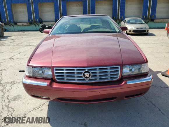 1997 Cadillac Eldorado ESC z VIN 1G6EL12Y5VU614955, wystawiony jako Copart lot #56222345 z przebiegiem 62 030 mil mil oraz Tytuł czysty. Historia ofert i sprzedaży dostępna na DreamBid. Obrazek 5.
