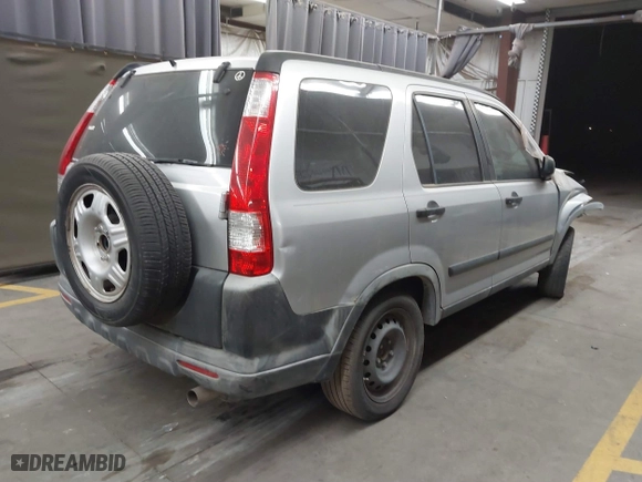 2005 Honda CR-V LX with VIN JHLRD68505C006906, listed as a IAAI auction lot 40301686 with 247,705 mi miles. Bid and sale history available at carsss.com. Image 4.
