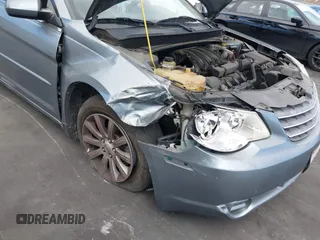 2010 Chrysler Sebring Touring with VIN 1C3BC5ED5AN187589, listed as a IAAI auction lot 42014513 with 114,044 mi miles and . Bid and sale history available at DreamBid. Image 6.