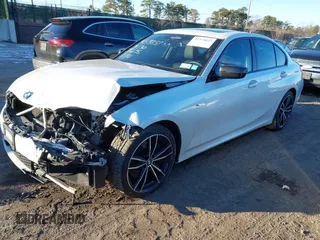 2020 BMW 3 Series M340i xDrive with VIN WBA5U9C00LFH73594, listed as a IAAI auction lot 41574837 with 46,702 mi miles and . Bid and sale history available at DreamBid. Image 2.