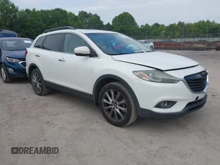 2015 Mazda CX-9 Grand Touring with VIN JM3TB2DA7F0448886, listed as a IAAI auction lot 42440203 with 108,765 mi miles and . Bid and sale history available at DreamBid. Image 1.