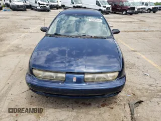 1997 Saturn SW z VIN 1G8ZK8279VZ361444, wystawiony jako Copart lot #58929684 z przebiegiem 128 554 mil mil oraz Tytuł czysty. Historia ofert i sprzedaży dostępna na DreamBid. Obrazek 5.