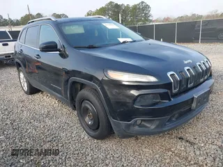 2014 Jeep Cherokee Latitude with VIN 1C4PJMCS7EW180565, listed as a IAAI auction lot 41770555 with 175,629 mi miles and . Bid and sale history available at DreamBid. Image 1.