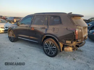 2023 Cadillac XT6 AWD Sport z VIN 1GYKPGRS6PZ108561, wystawiony jako Copart lot #71052284 z przebiegiem 31 496 mil mil oraz Szkoda całkowita • Salvage title. Historia ofert i sprzedaży dostępna na DreamBid. Obrazek 2.