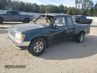 1995 Toyota T100 DX with VIN JT4VD12E1S0012010, listed as a Copart auction lot 83223154 with 253,492 mi miles and Salvage Title. Bid and sale history available at carsss.com. Image 1.