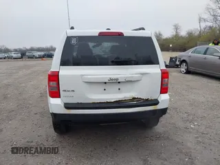 2014 Jeep Patriot Sport with VIN 1C4NJRBB1ED744101, listed as a IAAI auction lot 42009390 with 180,214 mi miles. Bid and sale history available at carsss.com. Image 17.
