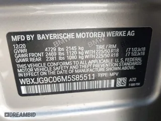 2021 BMW X1 xDrive28i with VIN WBXJG9C06M5S85511, listed as a IAAI auction lot 41705422 with 30,636 mi miles. Bid and sale history available at carsss.com. Image 9.