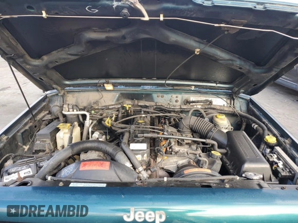 1998 Jeep Cherokee Sport with VIN 1J4FT68S2WL236774, listed as a Copart auction lot 77388734 with 128,591 mi miles and Clean Title. Bid and sale history available at carsss.com. Image 11.