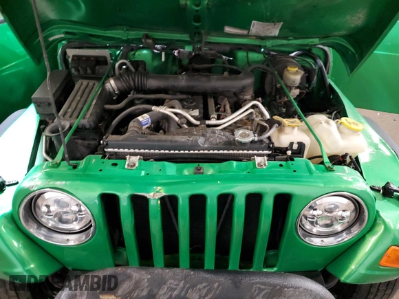 2005 Jeep Wrangler X с VIN 1J4FA39S35P305742, выставлен на аукционе Copart как лот 57124995 с пробегом 159 419 миль миль и Списание • Salvage title. История ставок и продаж доступна на DreamBid. Изображение 12.