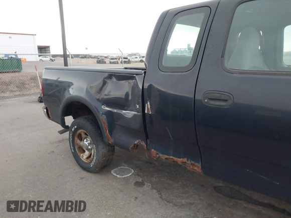 1999 Ford F-150 with VIN 1FTRX18W2XNA90069, listed as a IAAI auction lot 41496543 with 115,787 mi miles and . Bid and sale history available at DreamBid. Image 6.