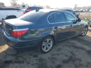 2009 BMW 5 Series 528i with VIN WBANU53519C118596, listed as a IAAI auction lot 41482725 with 130,975 mi miles and . Bid and sale history available at carsss.com. Image 4.