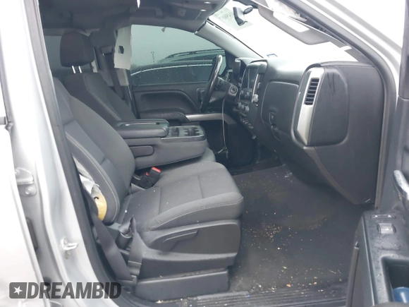 2018 Chevrolet Silverado 1500 LT with VIN 1GCRCREC4JZ287085, listed as a IAAI auction lot 41450057 with 79,275 mi miles and . Bid and sale history available at DreamBid. Image 5.