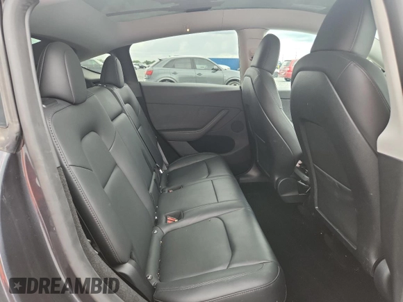2024 Tesla Model Y Long Range with VIN 7SAYGDEE9RA255688, listed as a Copart auction lot 58918665 with 21,302 mi miles and Salvage title. Bid and sale history available at DreamBid. Image 11.