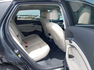 2019 Audi e-tron Premium Plus with VIN WA1LABGE6KB012565, listed as a IAAI auction lot 42220663 with 48,804 mi miles and . Bid and sale history available at DreamBid. Image 8.