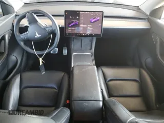 2022 Tesla Model Y Performance with VIN 7SAYGDEF8NF381644, listed as a Copart auction lot 44554585 with 71,413 mi miles and Salvage Title. Bid and sale history available at DreamBid. Image 8.