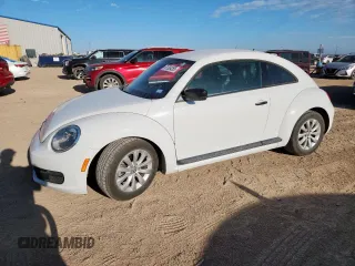 2016 Volkswagen Beetle Classic with VIN 3VWF17ATXGM606256, listed as a Copart auction lot 61304265 with 85,292 mi miles and Salvage title. Bid and sale history available at DreamBid. Image 1.
