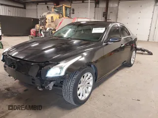 2014 Cadillac CTS Luxury AWD with VIN 1G6AX5S36E0173682, listed as a IAAI auction lot 41538709 with 102,772 mi miles and . Bid and sale history available at DreamBid. Image 18.