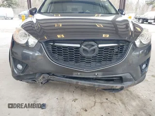 2015 Mazda CX-5 Grand Touring with VIN JM3KE2DY0F0508796, listed as a IAAI auction lot 41798482 with 110,260 mi miles. Bid and sale history available at carsss.com. Image 6.