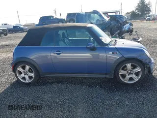 2005 MINI Convertible S with VIN WMWRH33455TF82408, listed as a IAAI auction lot 41857791 with 133,824 mi miles and . Bid and sale history available at DreamBid. Image 13.