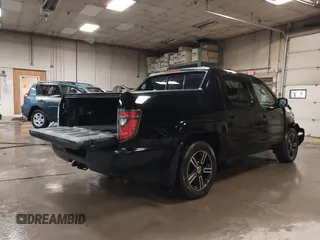 2013 Honda Ridgeline Sport with VIN 5FPYK1F77DB001247, listed as a IAAI auction lot 42346926 with 187,565 mi miles and . Bid and sale history available at DreamBid. Image 4.