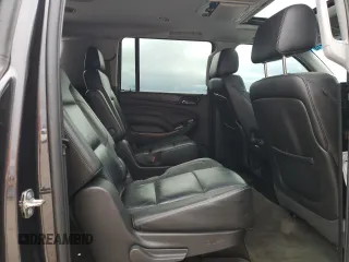 2015 Chevrolet Suburban LT with VIN 1GNSCJKC1FR159411, listed as a Copart auction lot 52169465 with 145,511 mi miles and Salvage title. Bid and sale history available at DreamBid. Image 12.