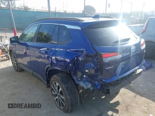 2022 Toyota Corolla Cross XLE with VIN 7MUDAAAG7NV024323, listed as a IAAI auction lot 42643048 with 76,465 mi miles and . Bid and sale history available at DreamBid. Image 3.